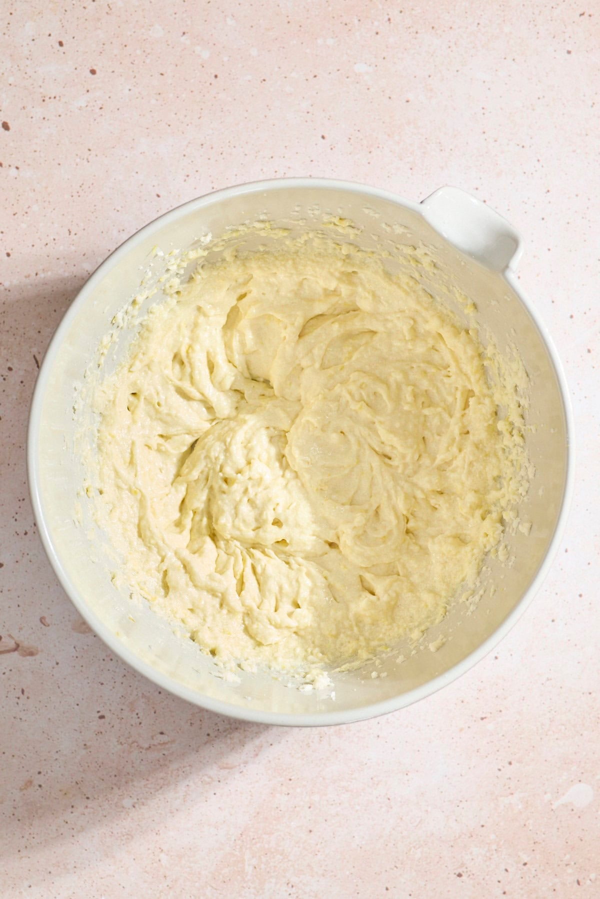 Wet ingredients mixed in a large mixing bowl.