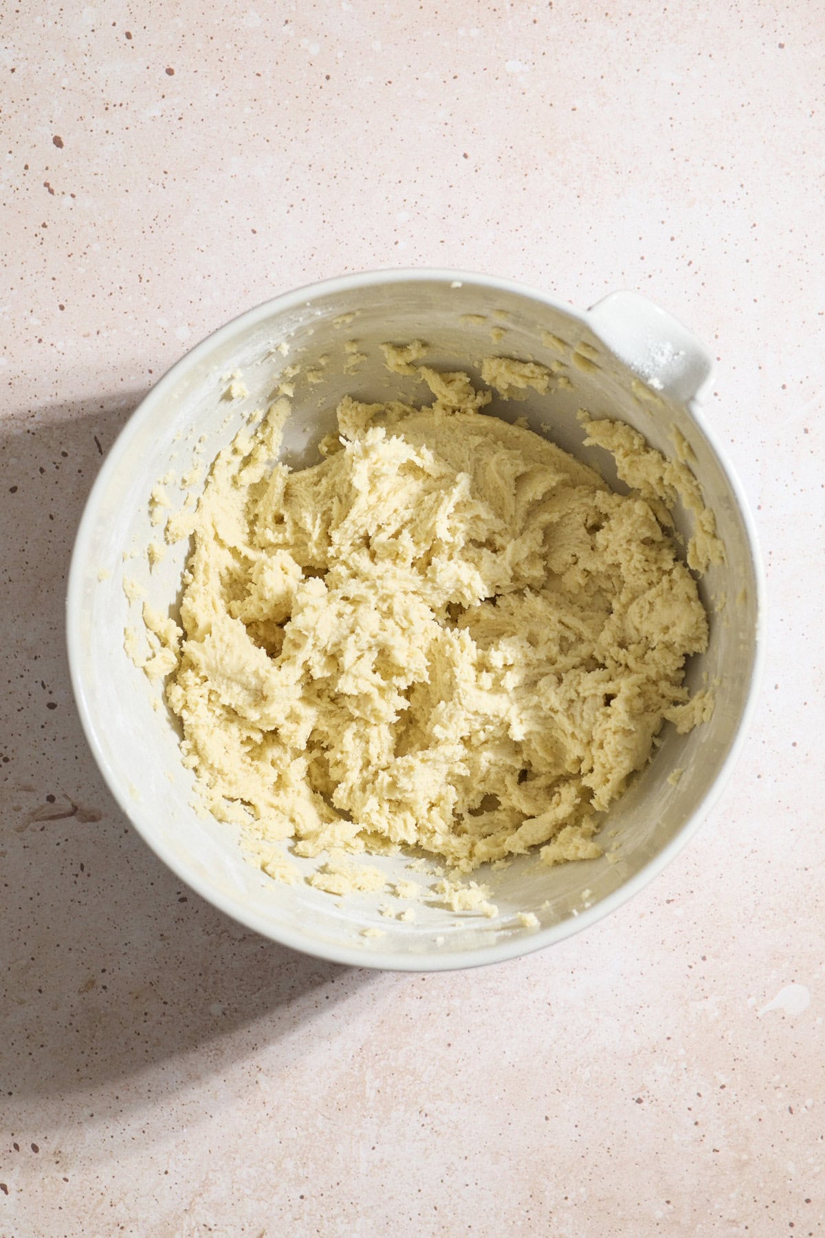 Cookie dough in a mixing bowl.