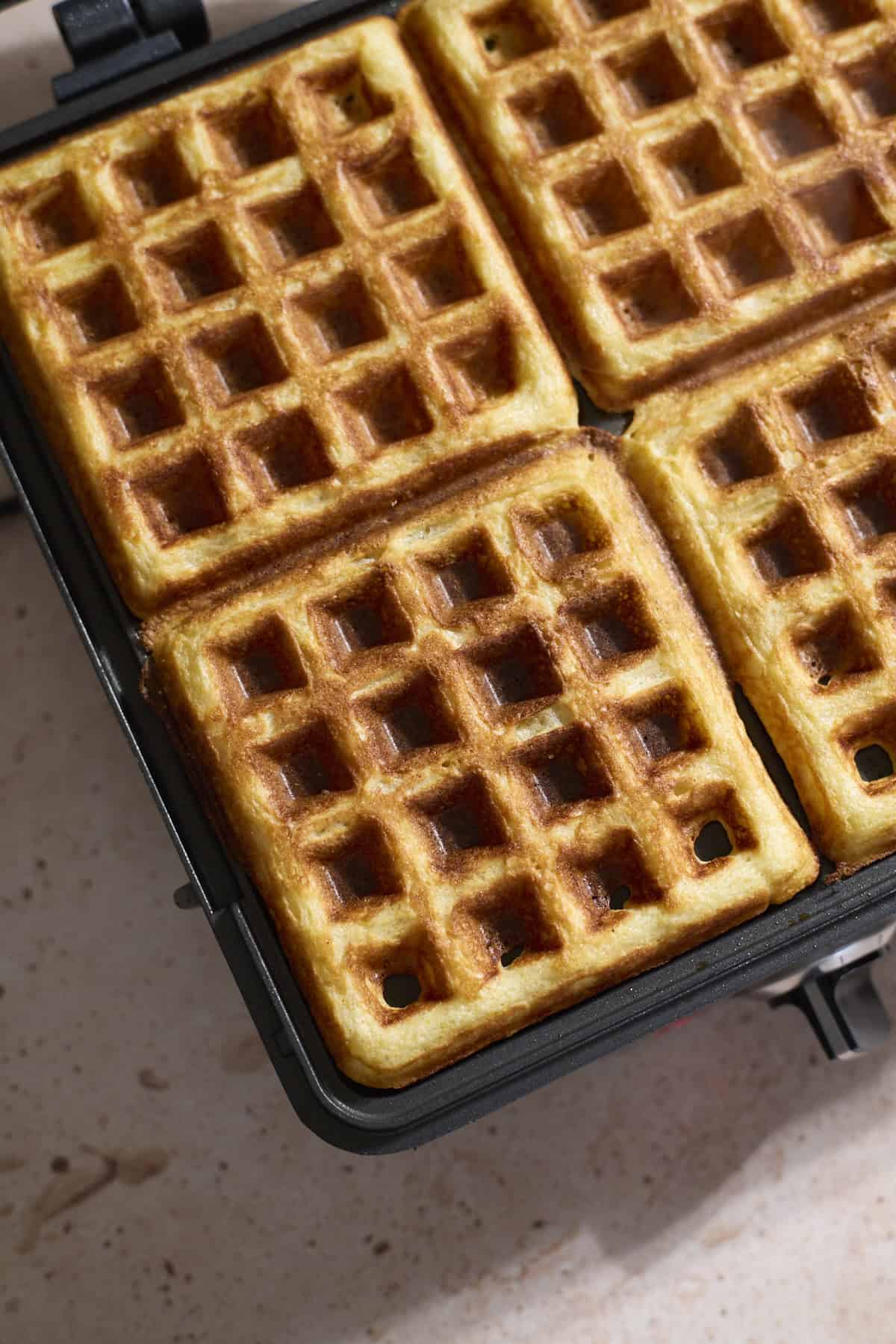 Waffles after baking in a waffle iron.