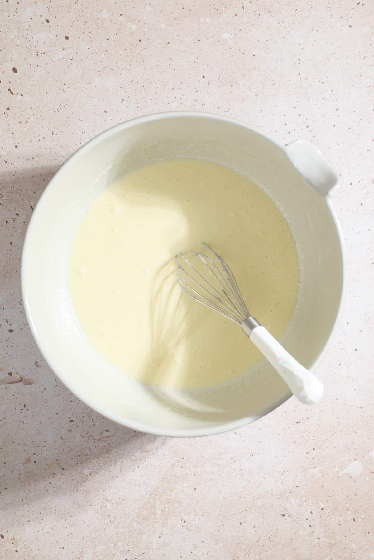 Wet ingredients in a mixing bowl.