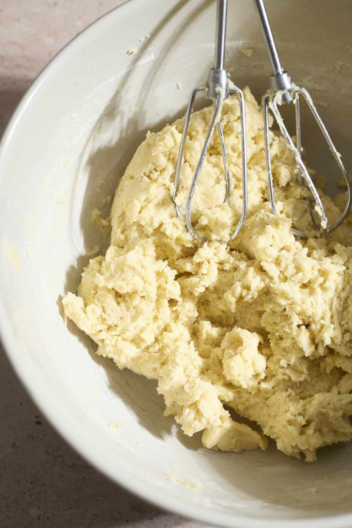 Cookie dough in a mixing bowl.