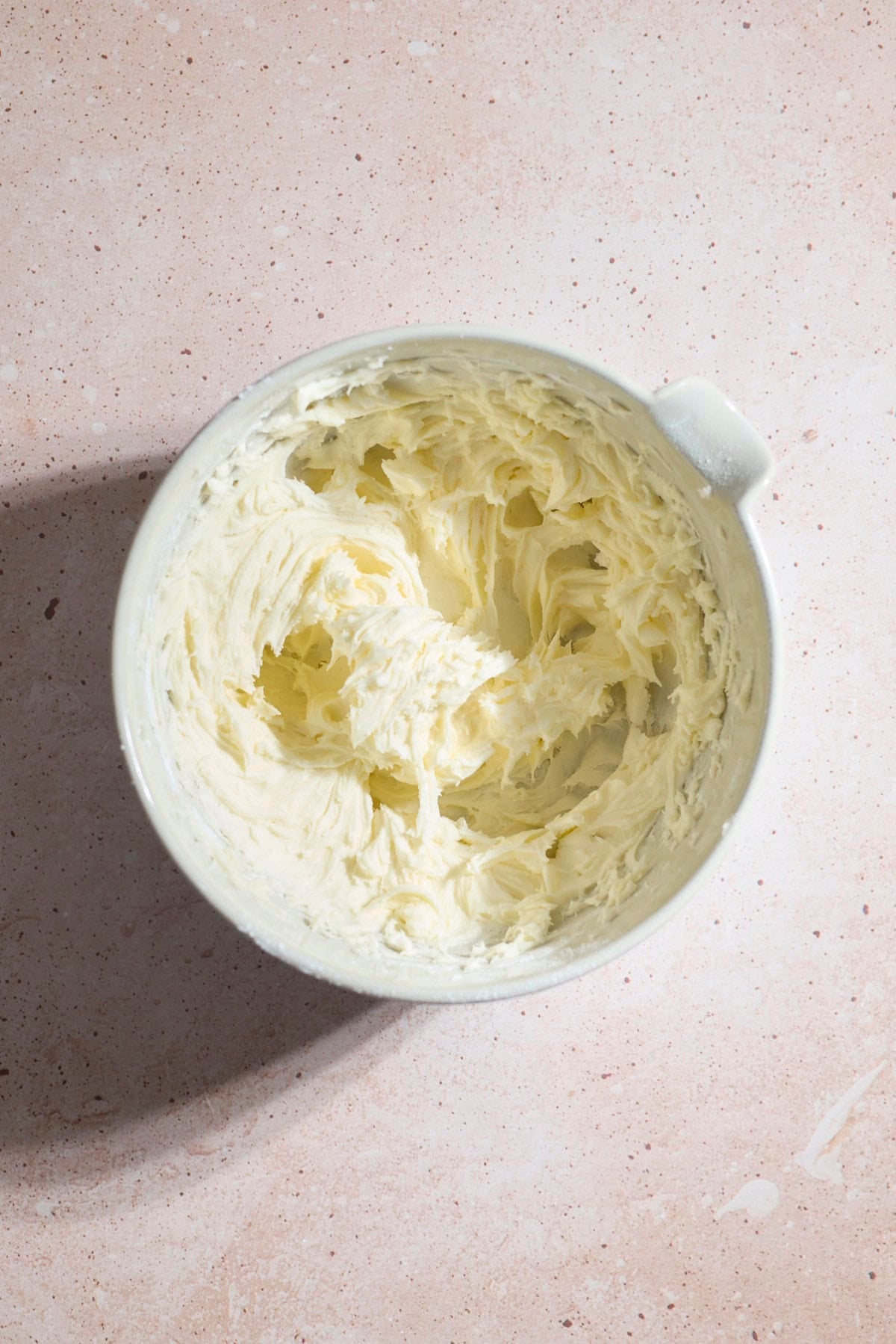 Frosting mixed in a large bowl.