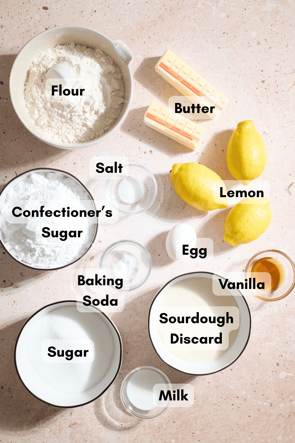 Ingredients for Sourdough Discard Lemon Cookie Bars in small bowls.