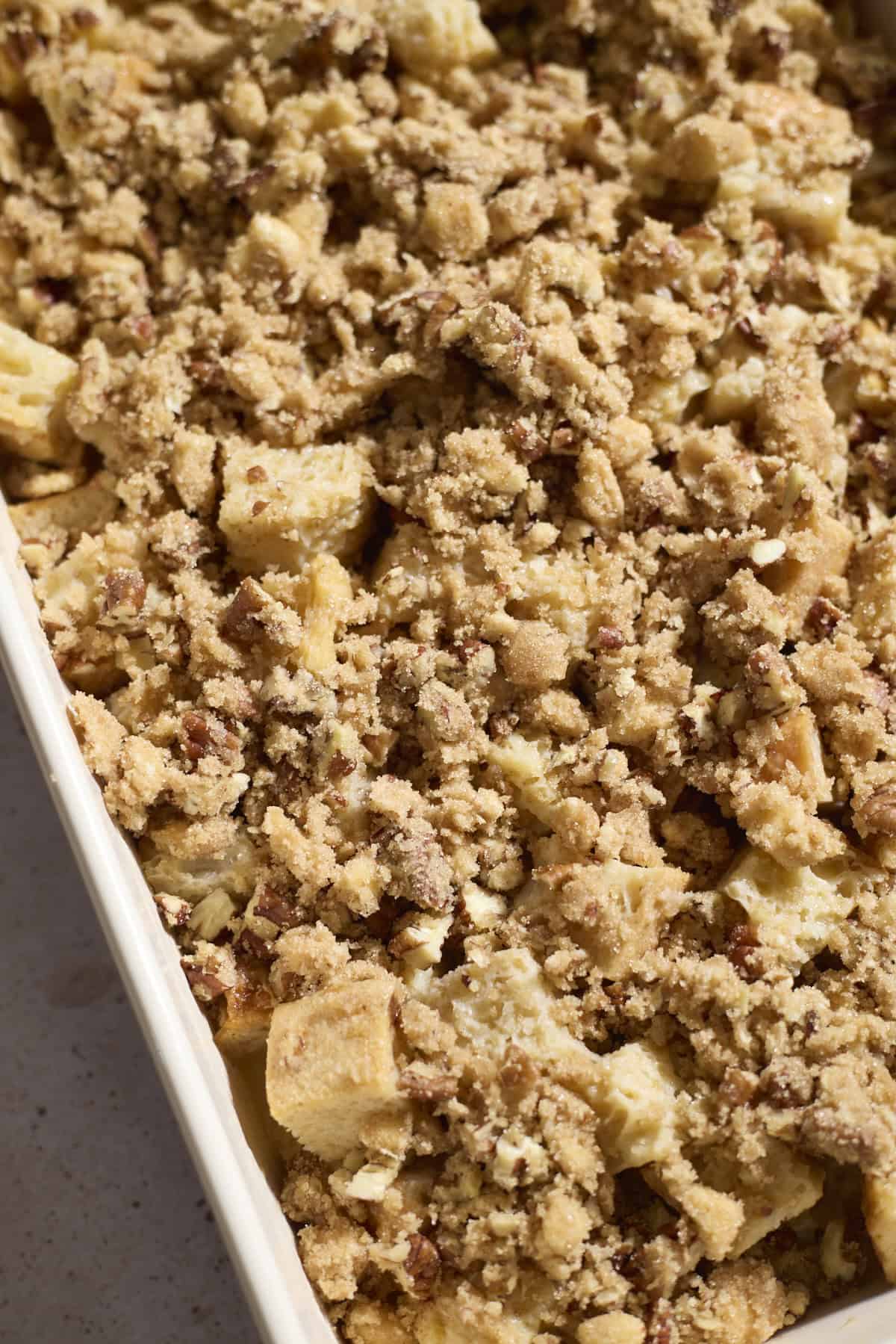 Topping spread on the bread.