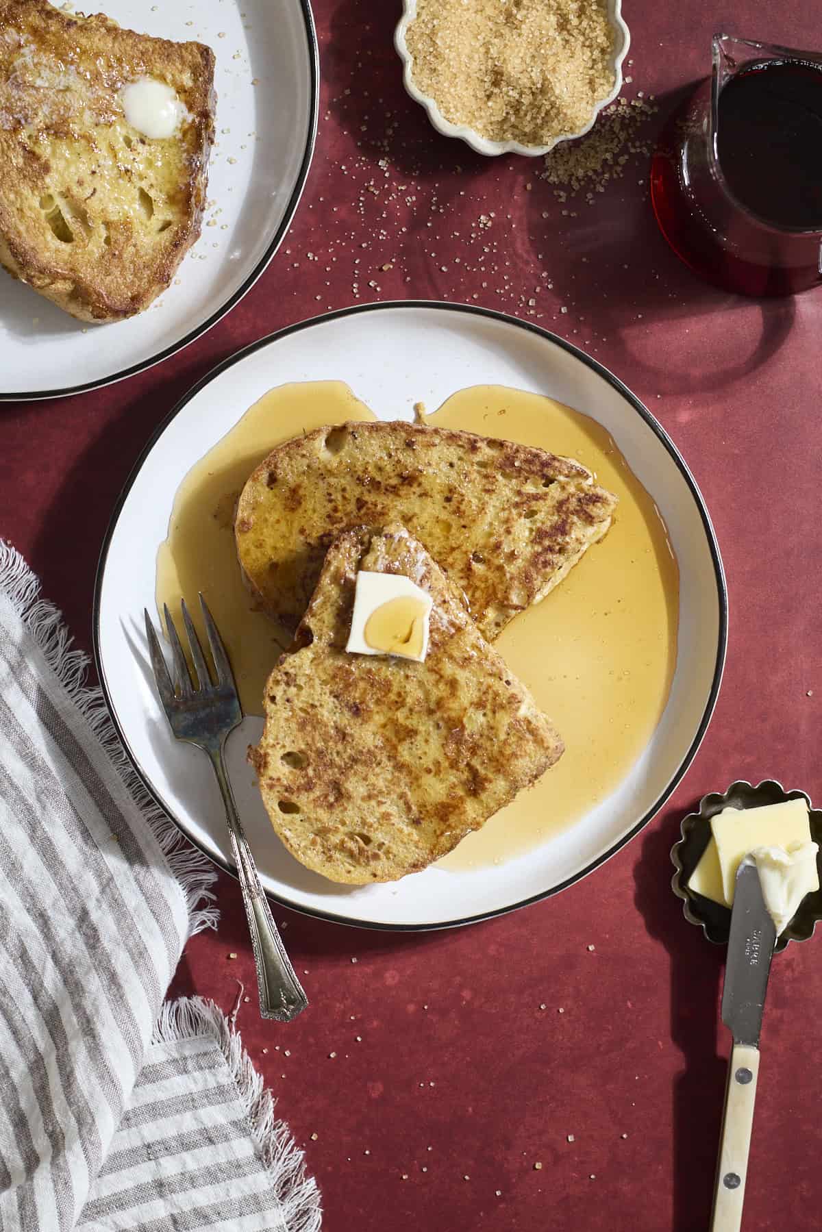 Sourdough French Toast on a white plate.