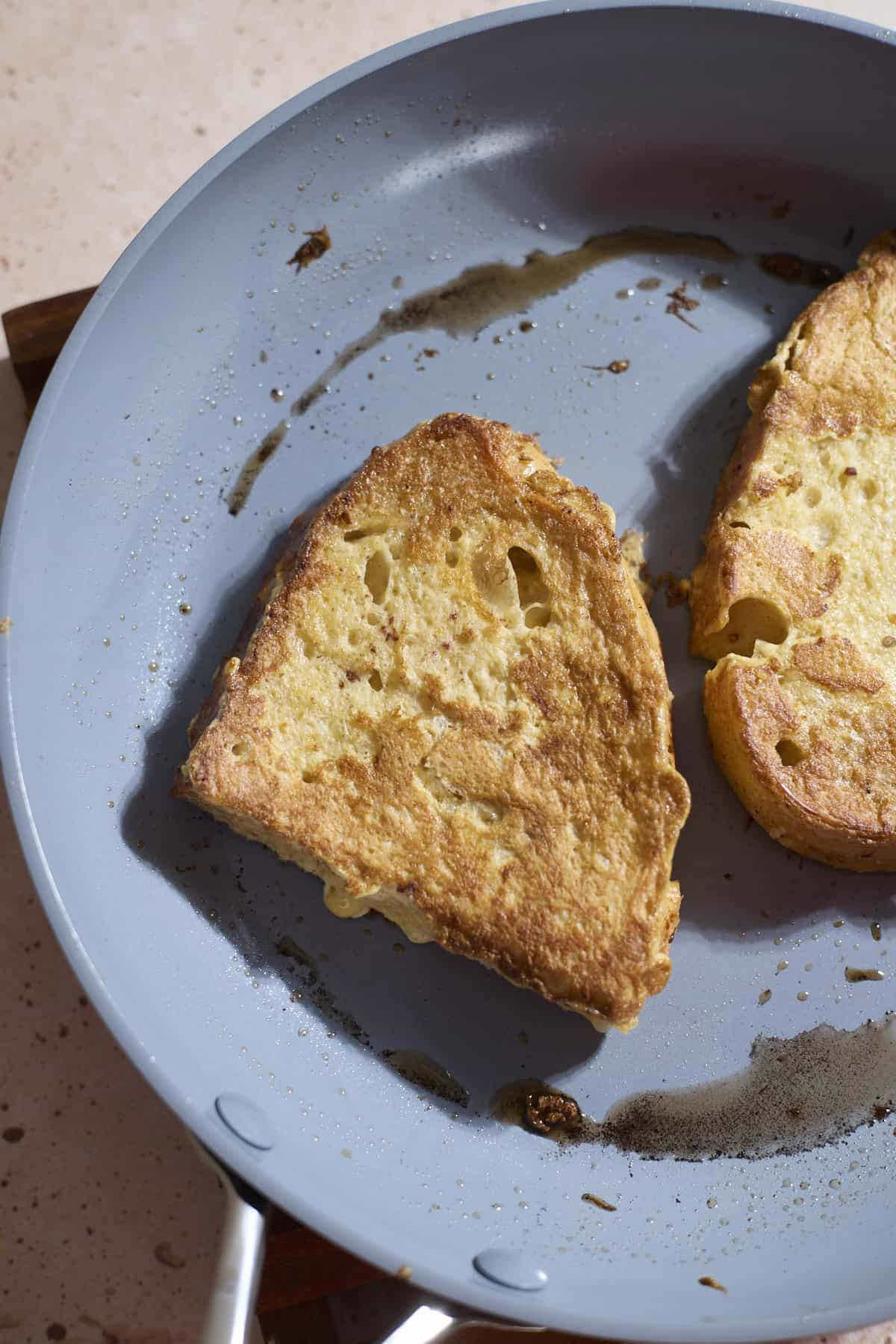 French toast cooking in a small skillet.