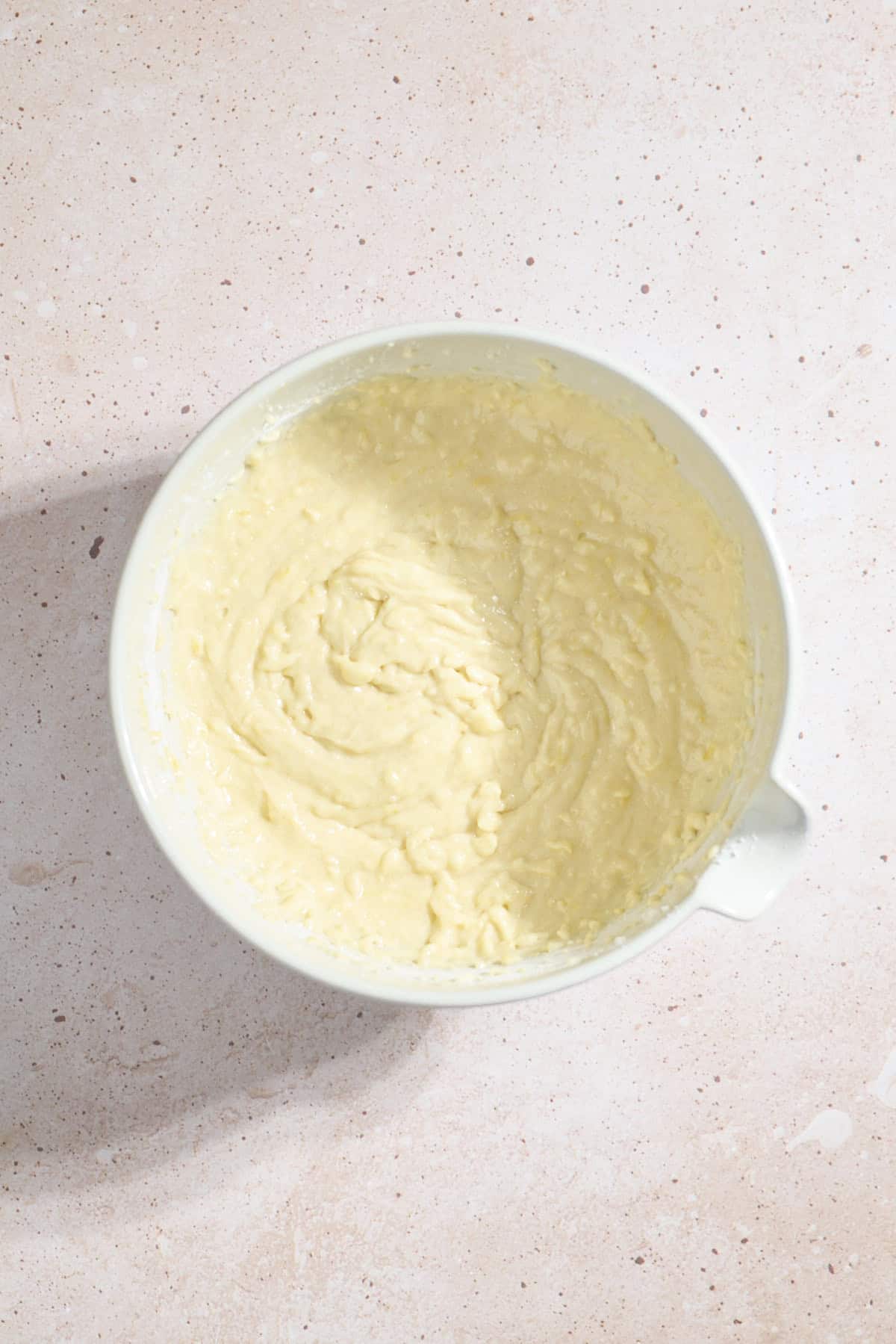 Cake batter in a large mixing bowl.