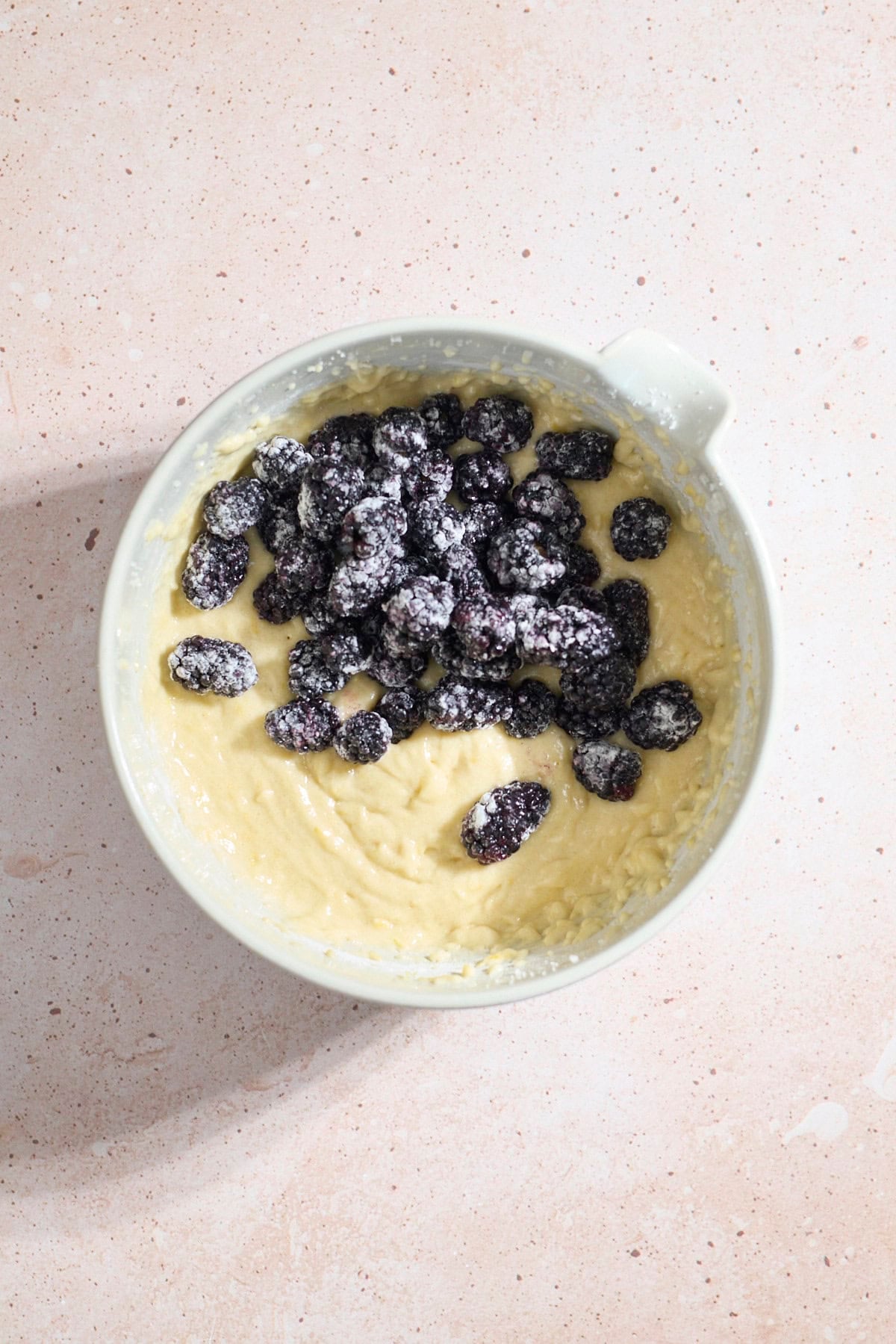 Berries added to the cake batter.