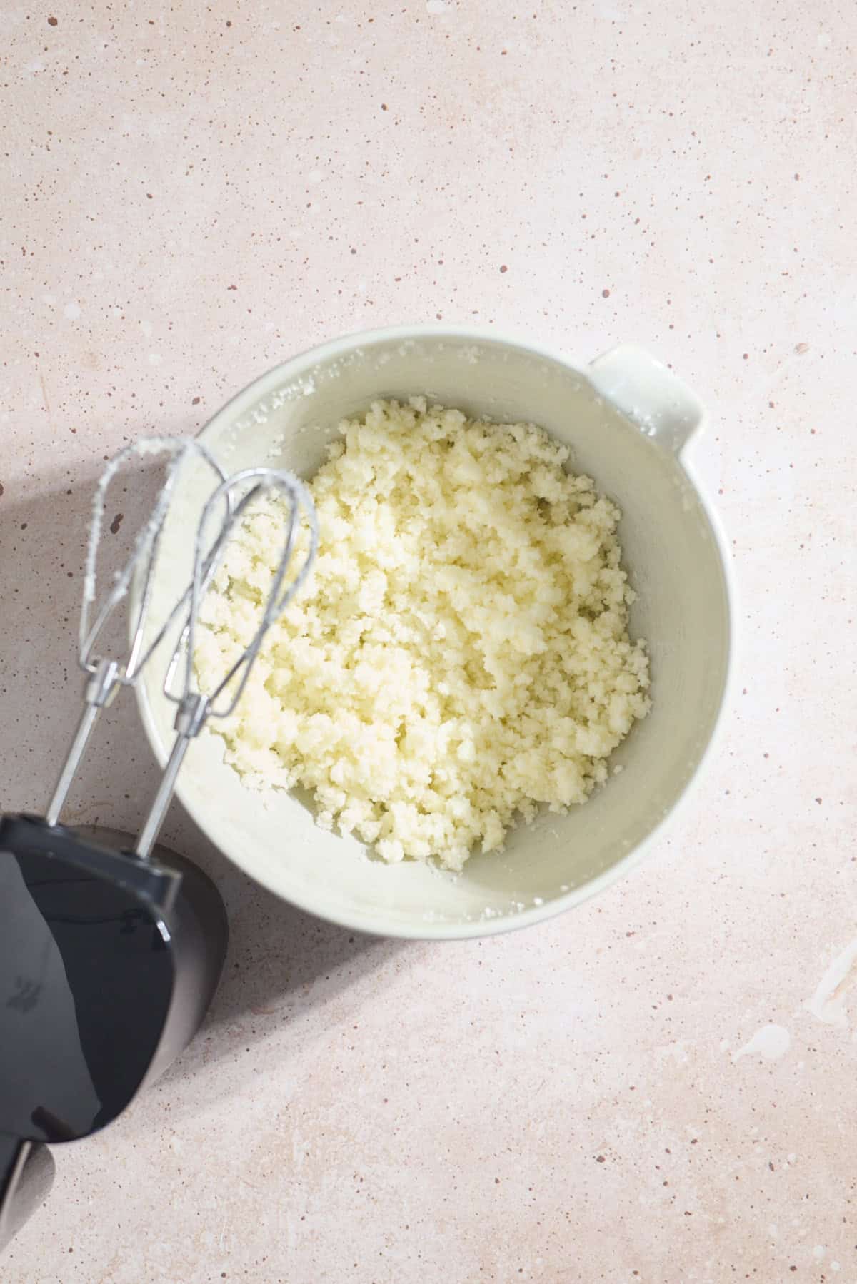 Creamed butter and sugar in a mixing bowl.