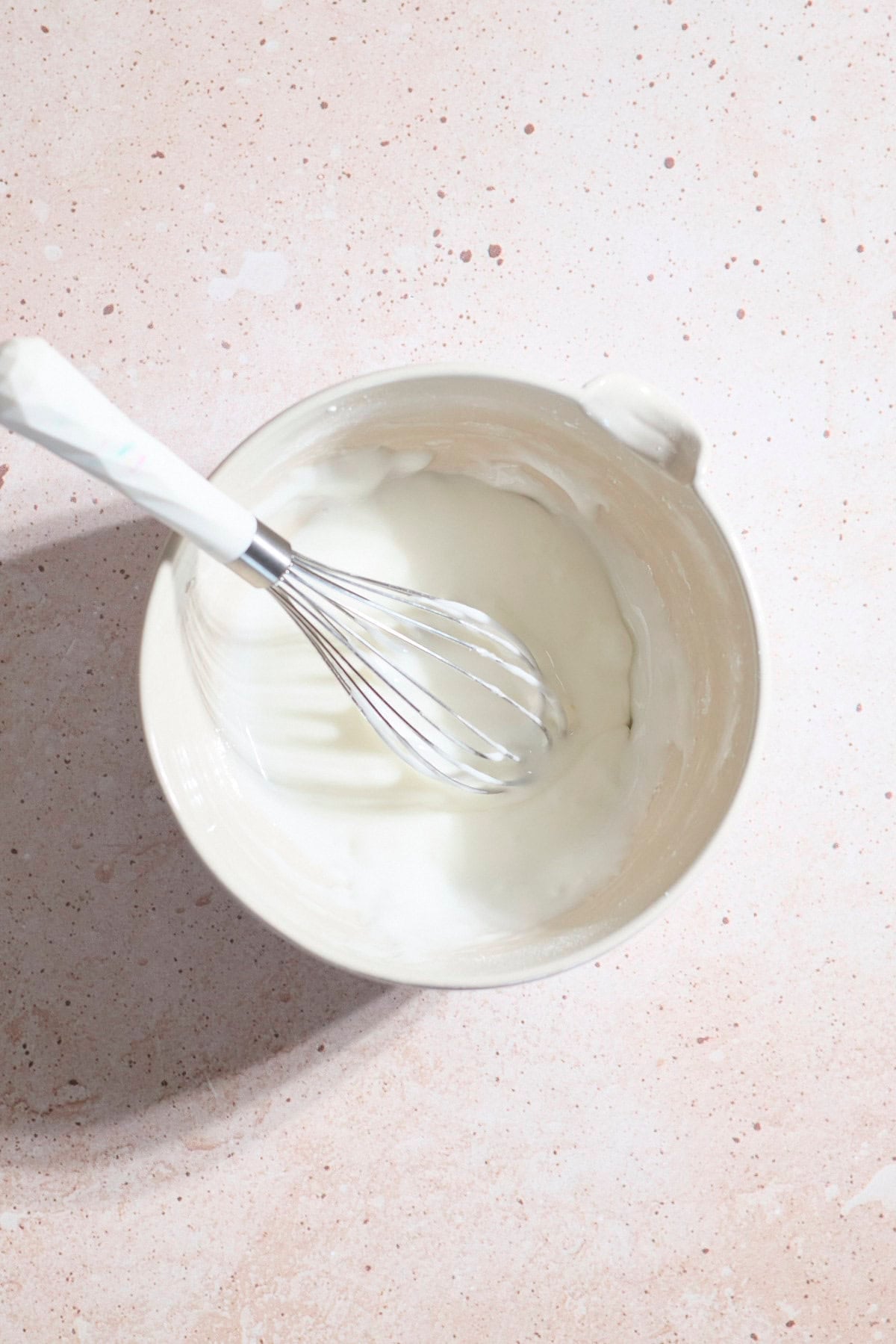 Glaze mixed together in a mixing bowl.