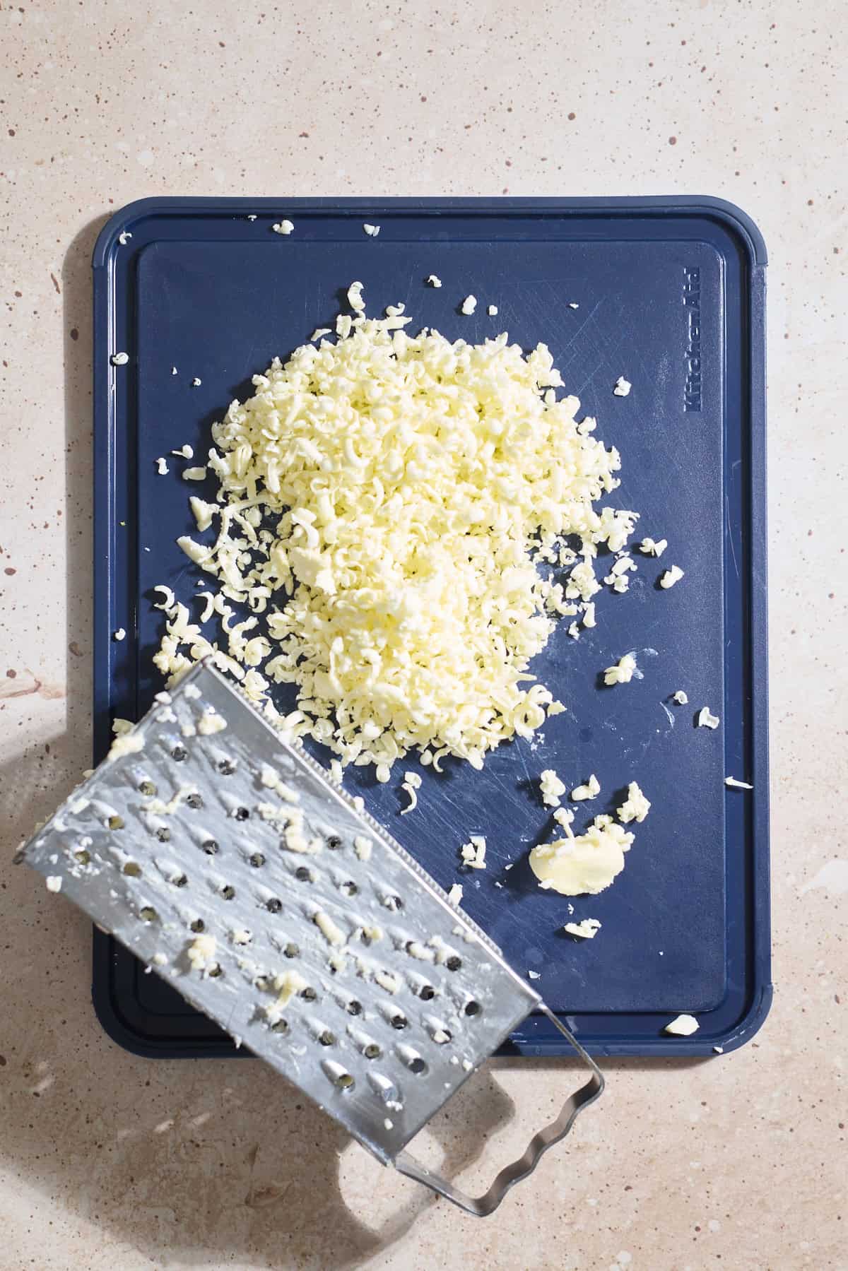 Butter grated on a box grater.