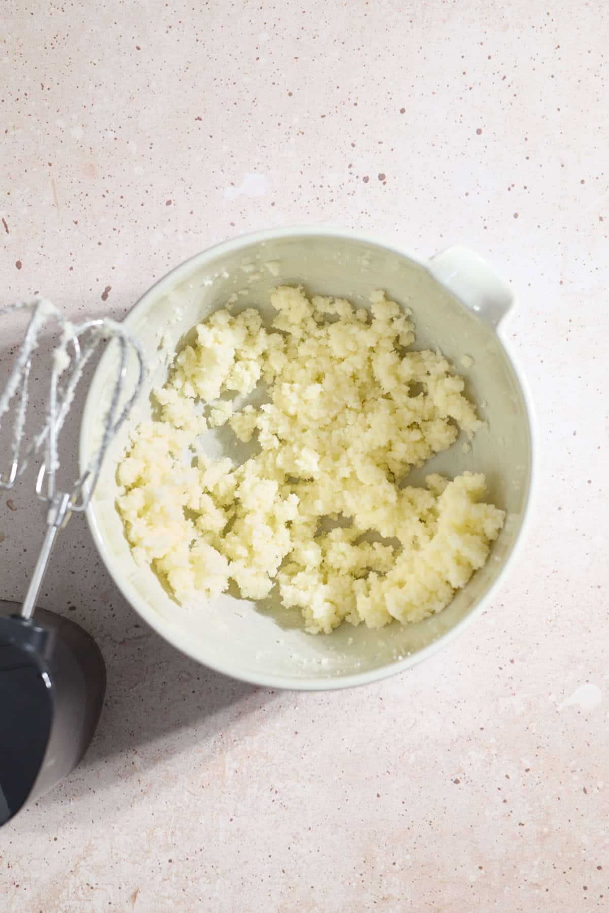 Creamed butter and sugar in a large mixing bowl.