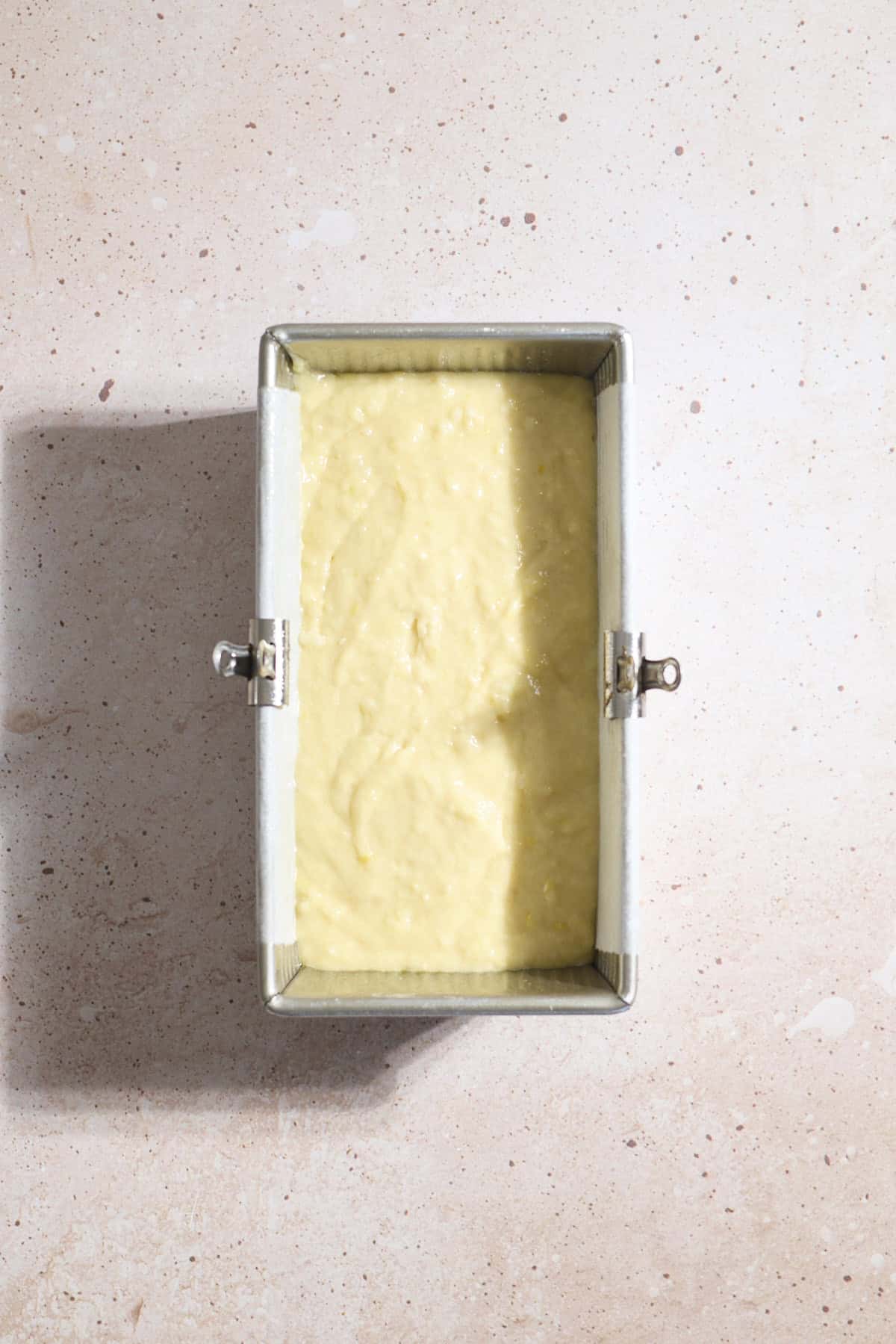 Batter spread into the baking pan.