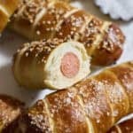 Sourdough Discard Pretzel-Wrapped Hot Dogs in a pile.