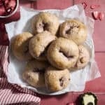 Sourdough Discard Strawberry Bagels on a white platter.