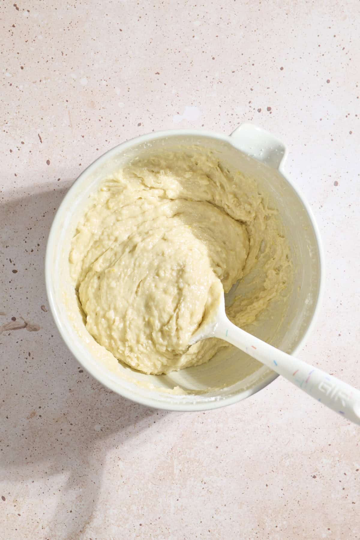 Cake batter in a large mixing bowl.