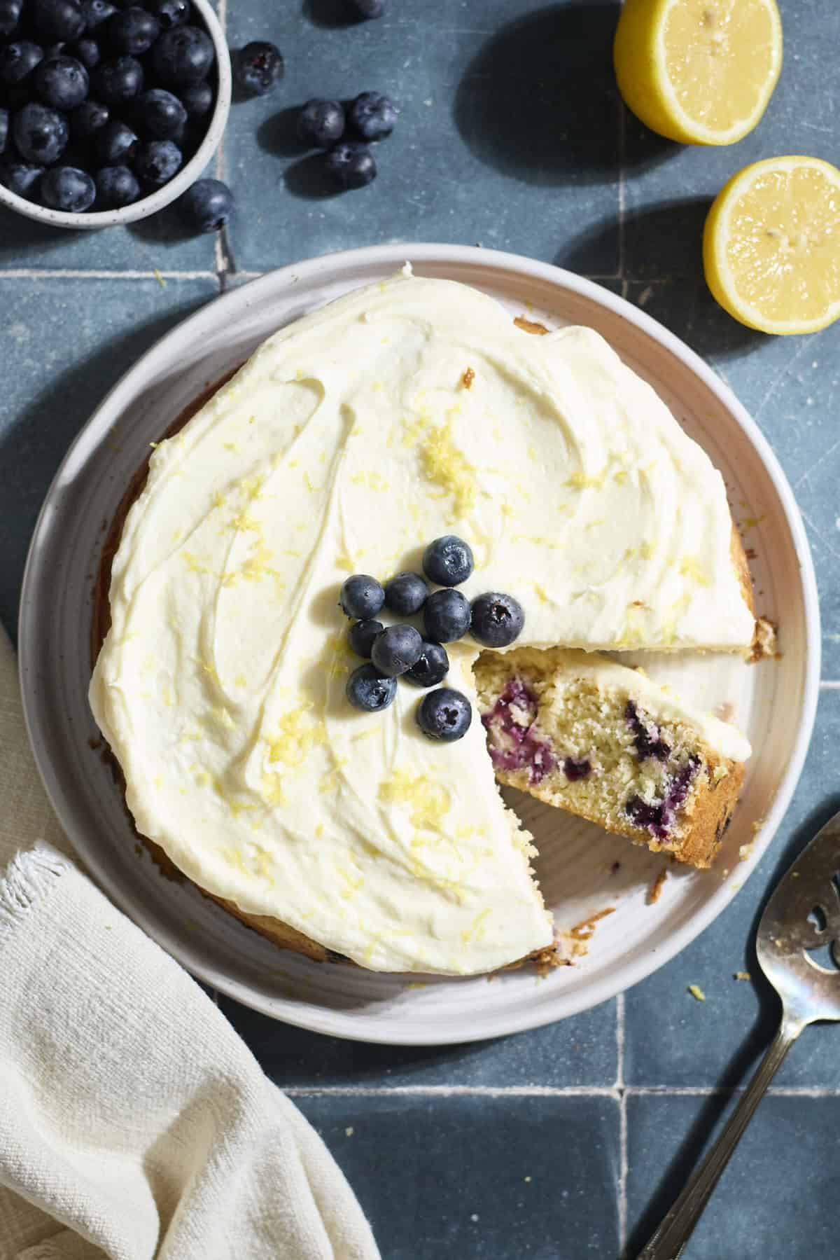 A sliced Sourdough Lemon Blueberry Cake.