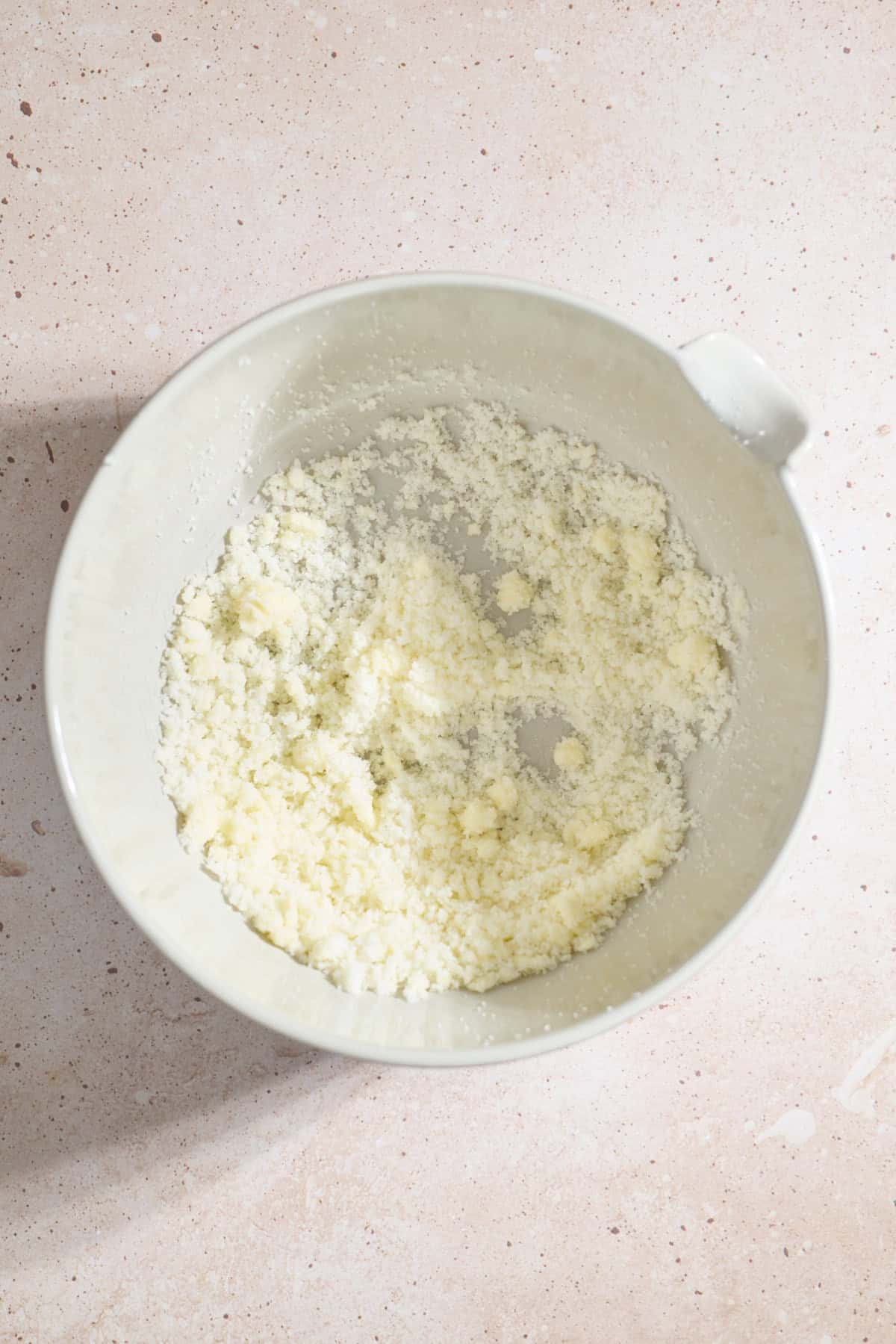 Creamed butter and sugar in a mixing bowl.