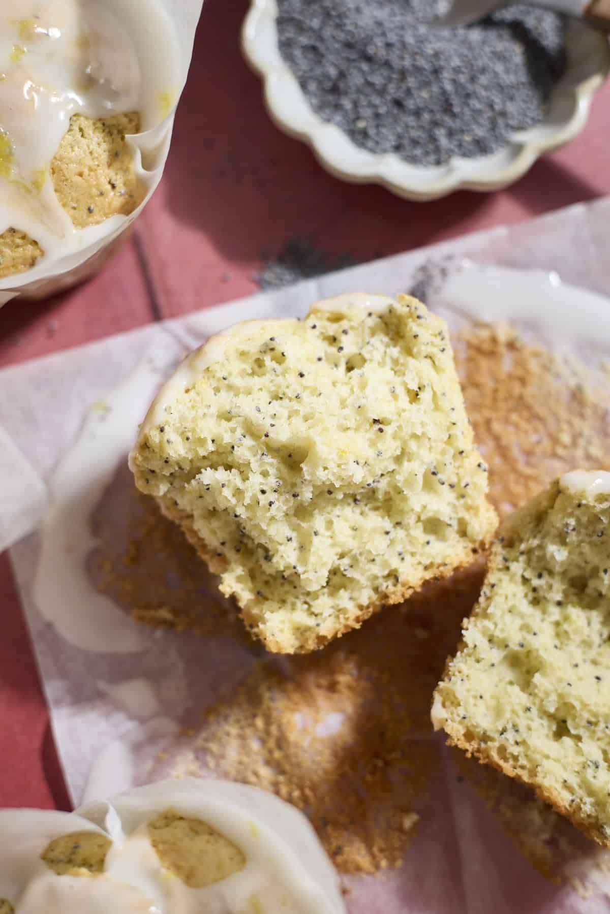 A Sourdough Lemon Poppy Seed Muffins cut in half.