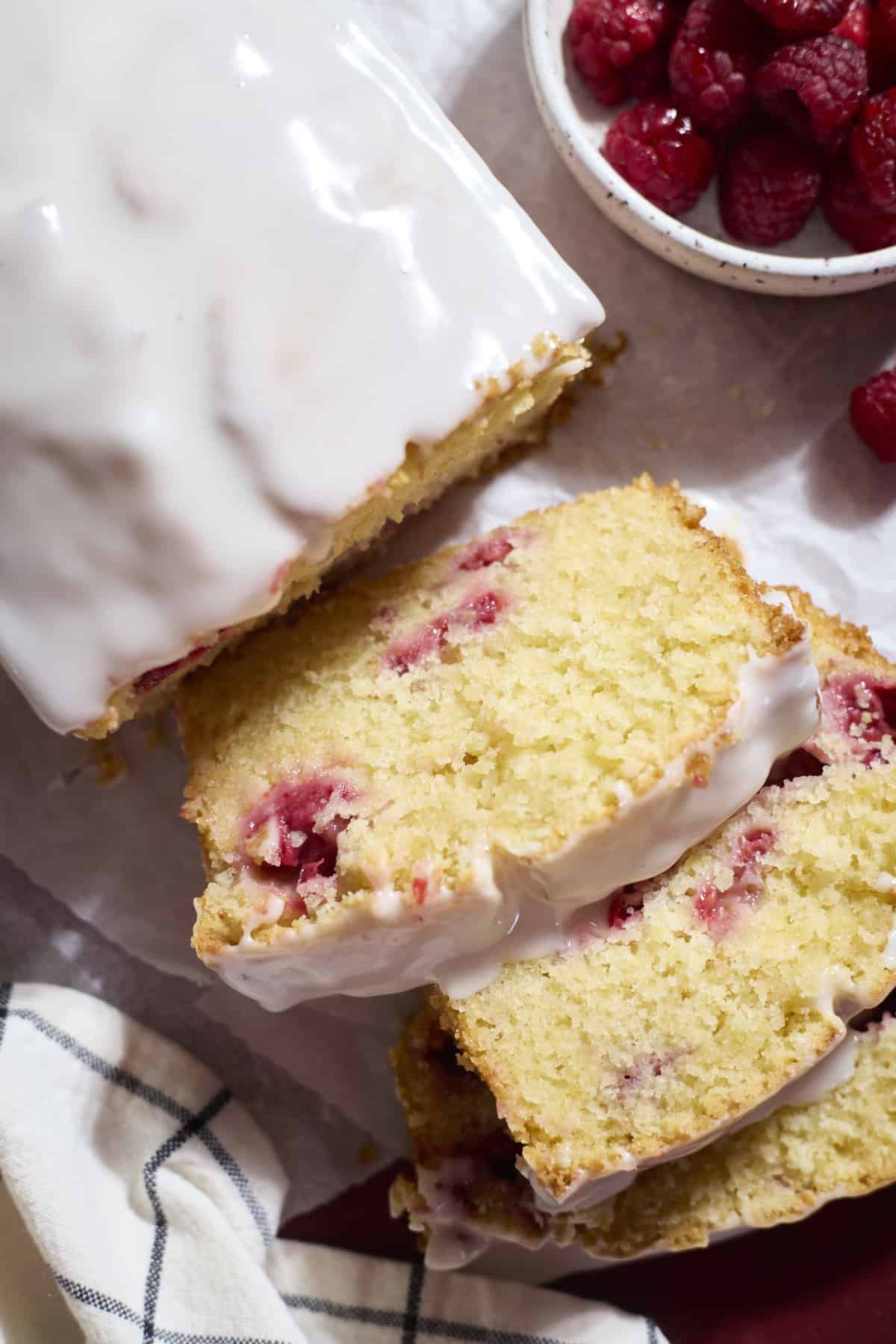 Slices of Sourdough Lemon Raspberry Loaf Cake.
