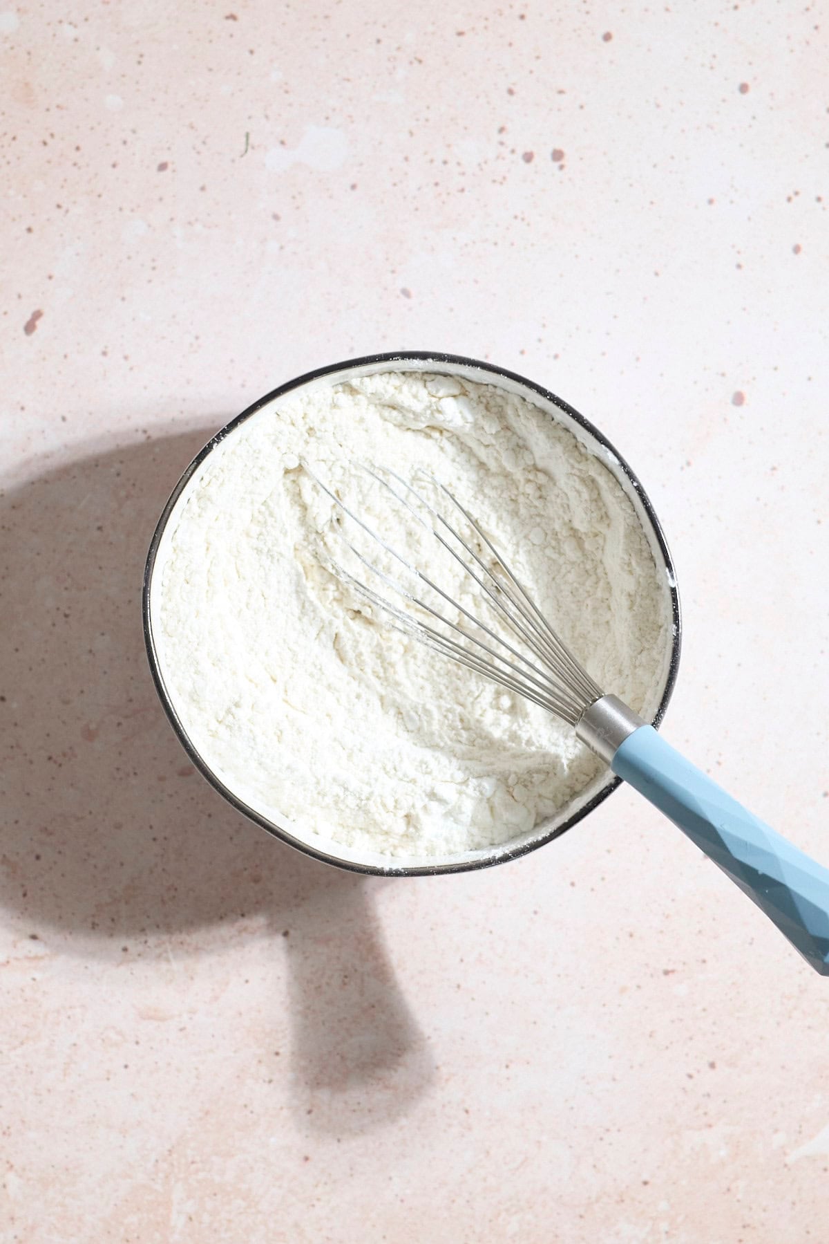 Dry ingredients in a small mixing bowl.