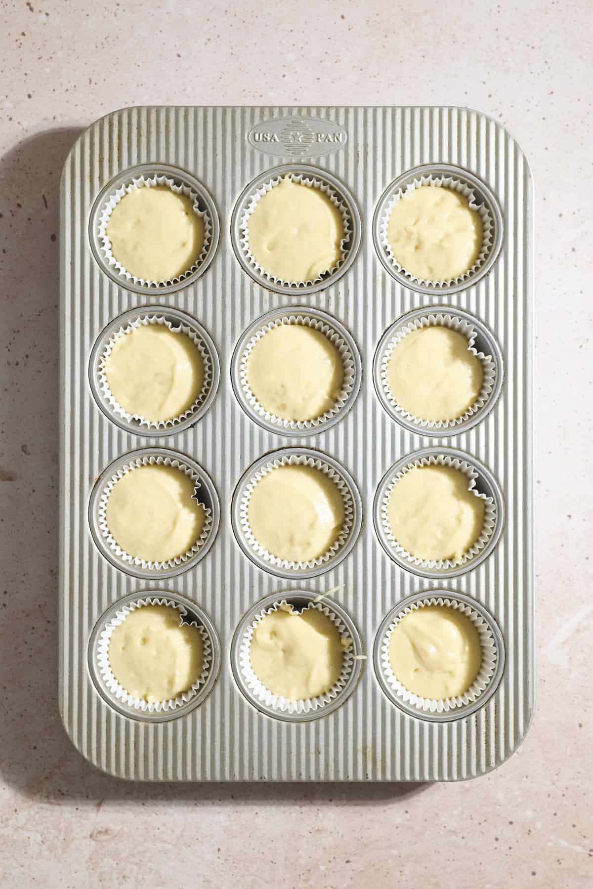 Cupcake batter in the cupcake liners.