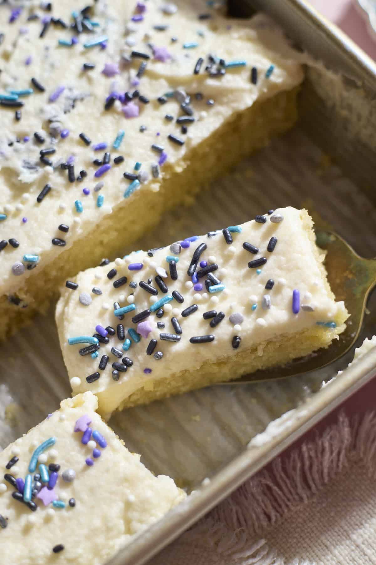 Slices of Sourdough Vanilla Sheet Cake.