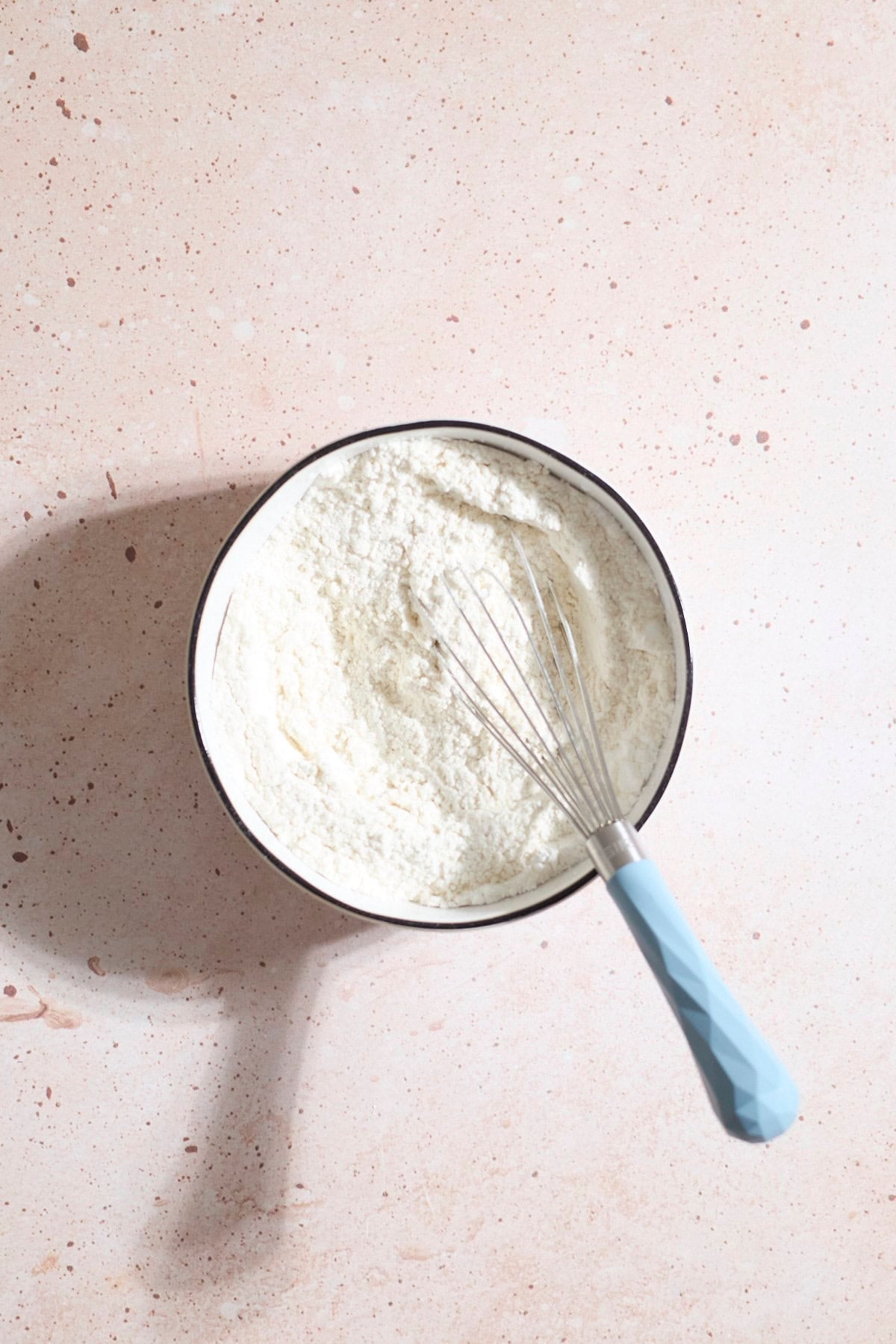 Dry ingredients in a small mixing bowl.