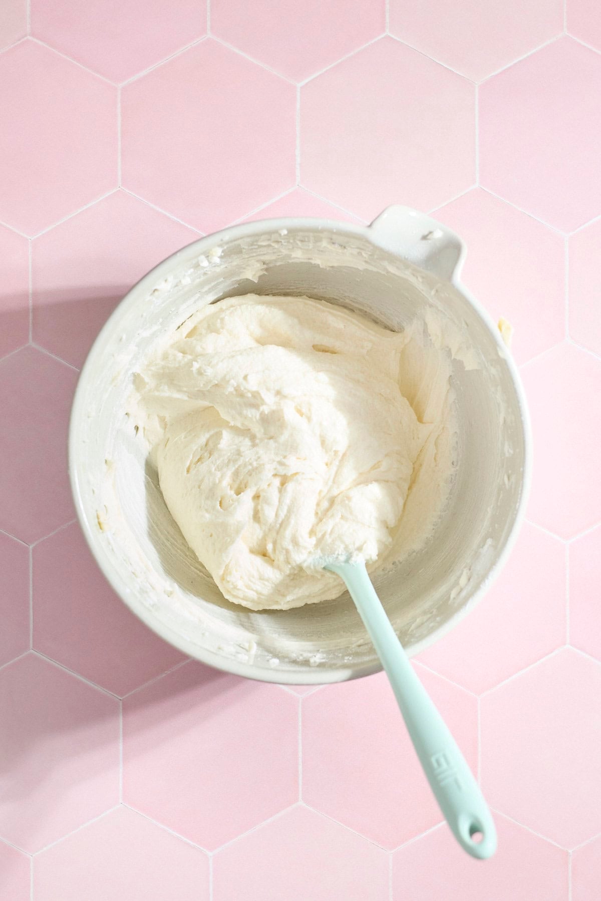Frosting in a mixing bowl.