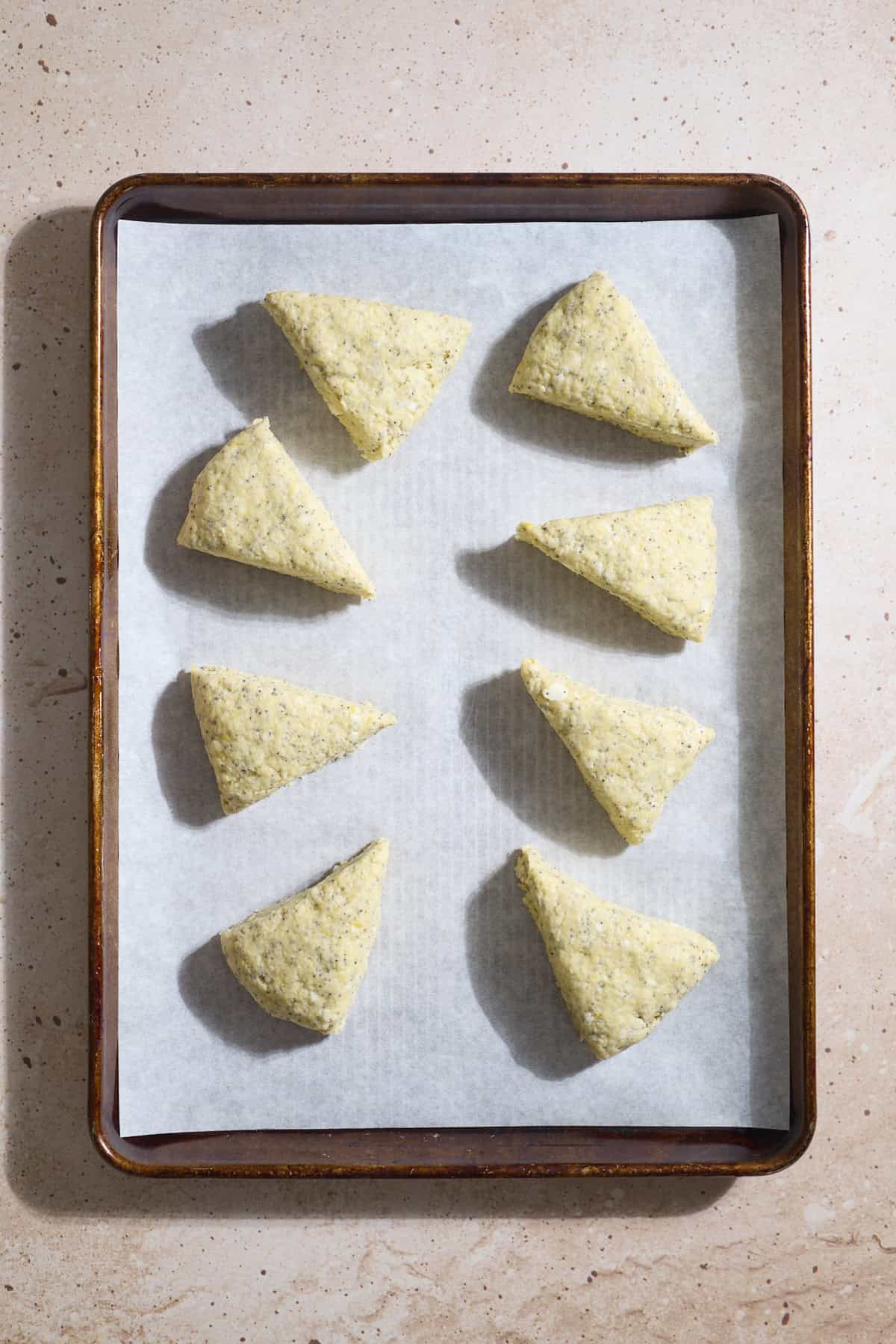 Scones on a baking sheet.
