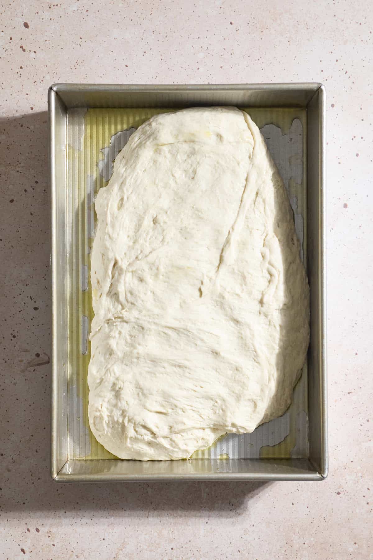 Dough in a 9x13-inch baking pan.