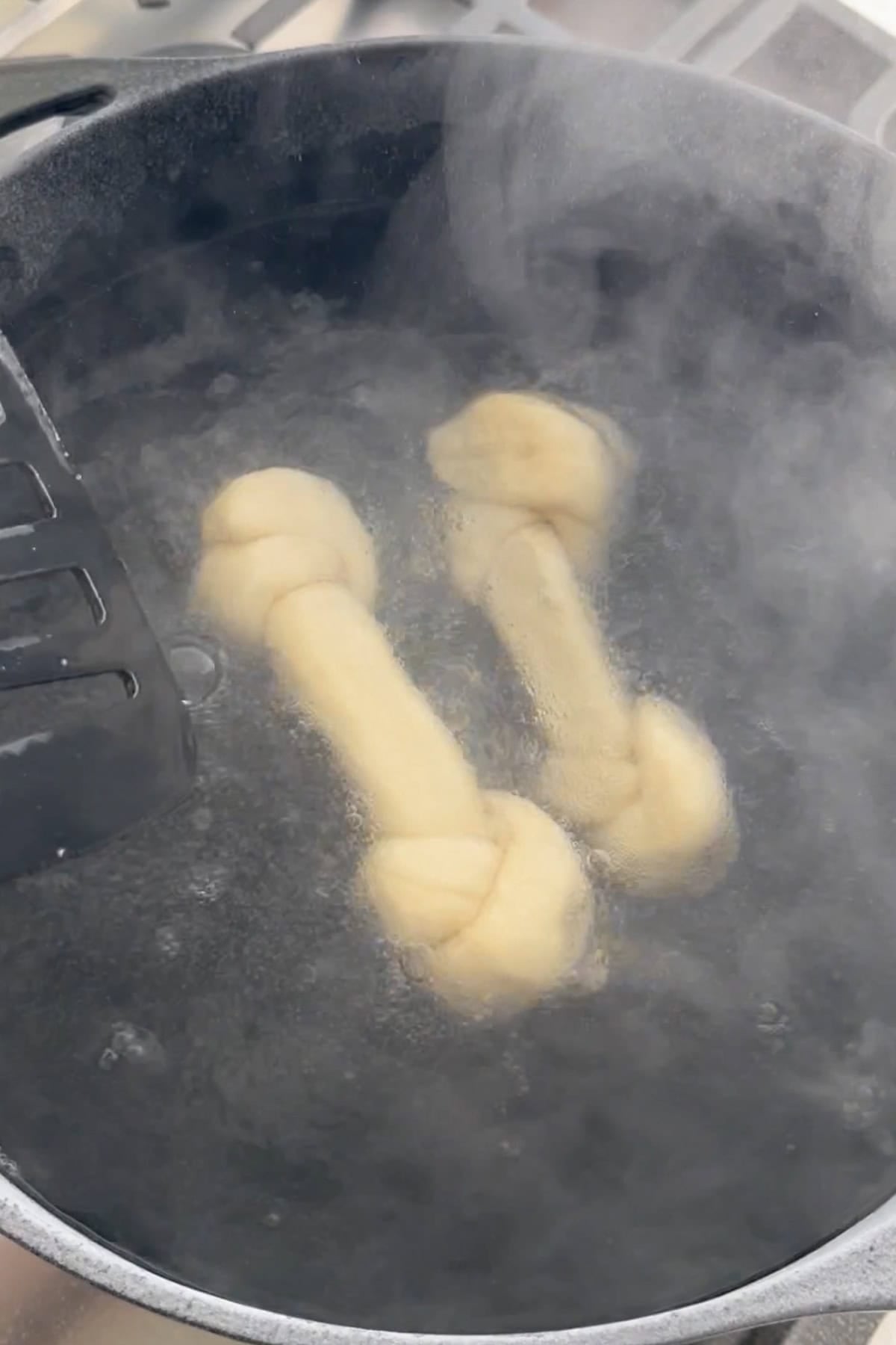 Pretzel bones in boiling water.