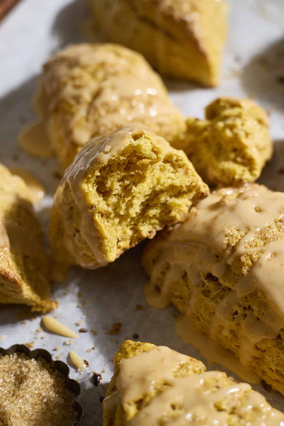 The interior crumb of a pumpkin scone.