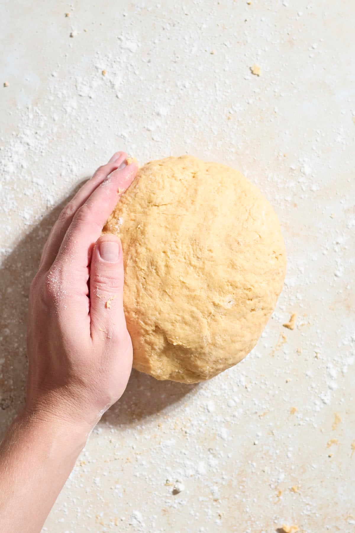 Dough shaped into a disk.