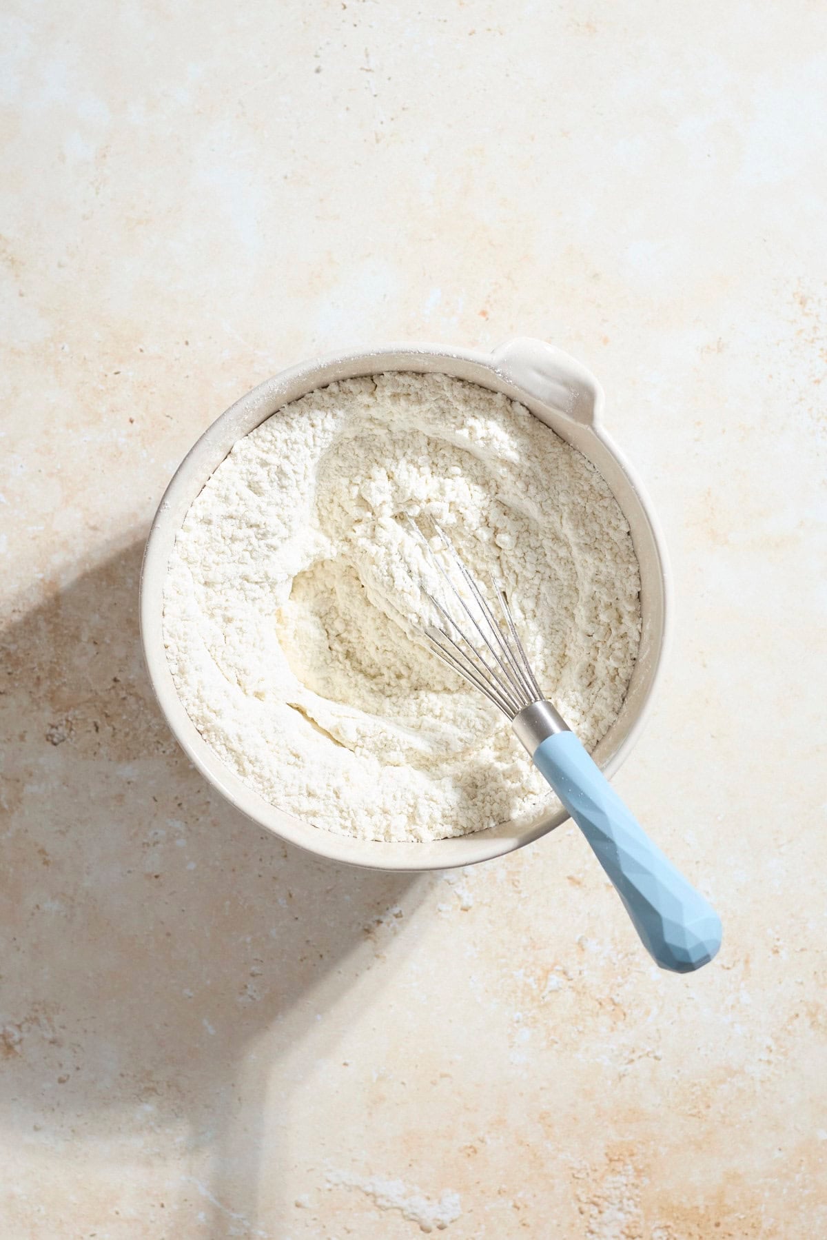 Dry ingredients in a small mixing bowl.
