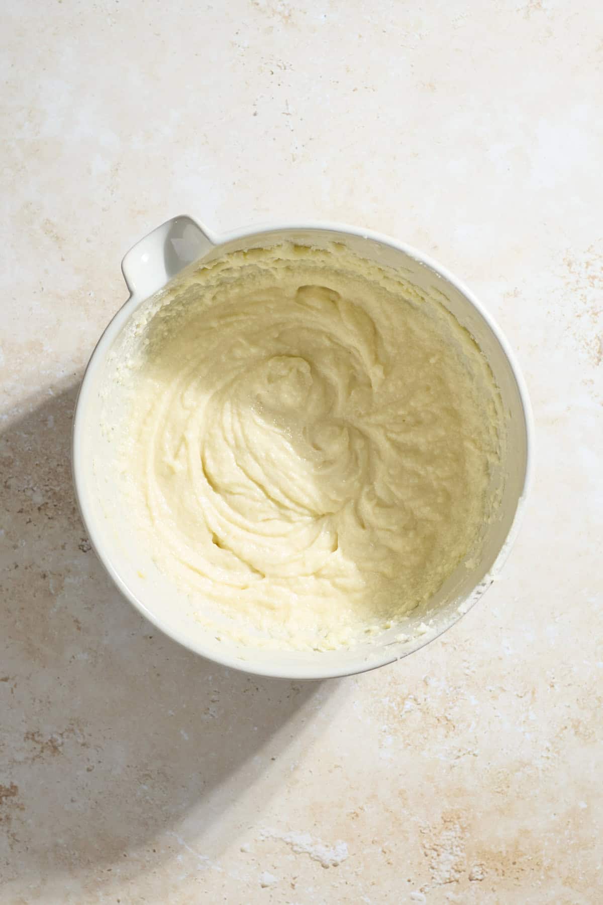 Wet ingredients mixed in a large mixing bowl.